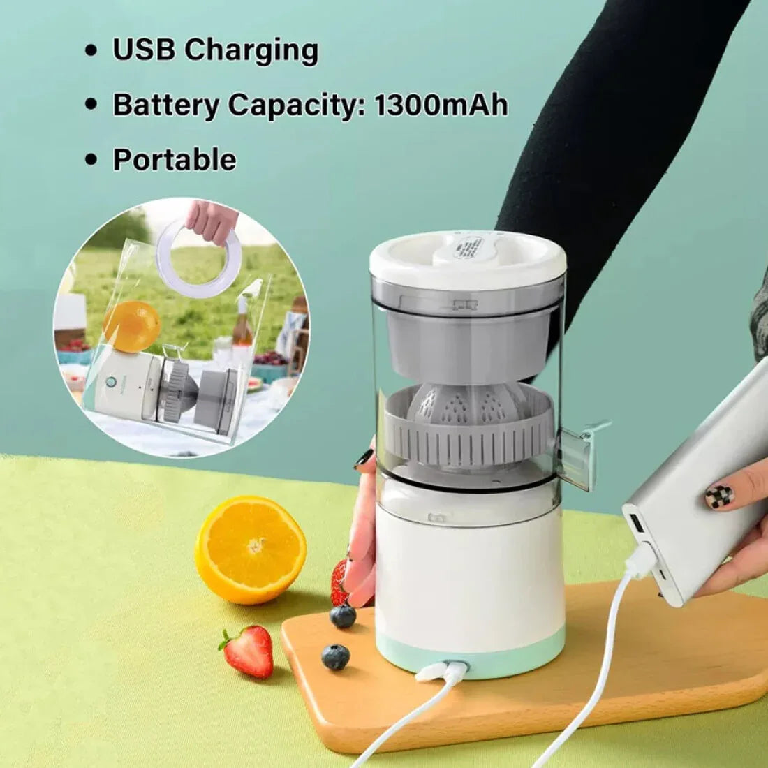 Compact portable fruit juicer squeezing fresh lemon juice